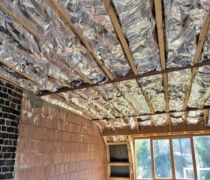 exposed framing and insulation in home 