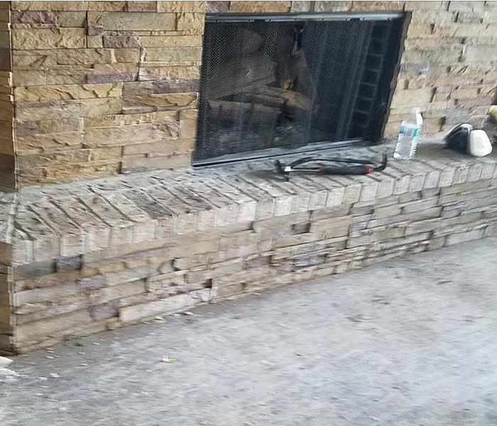 fireplace with damage