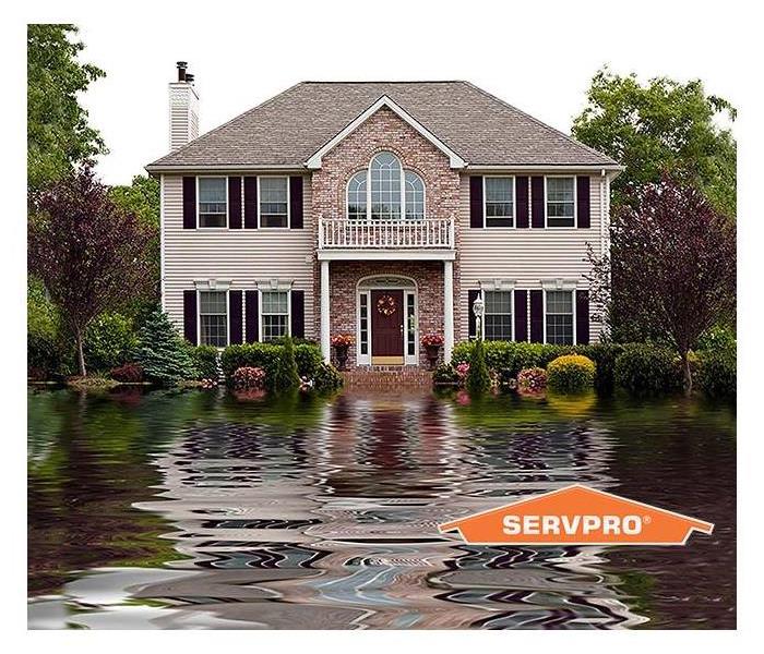 home surrounded by flood water 